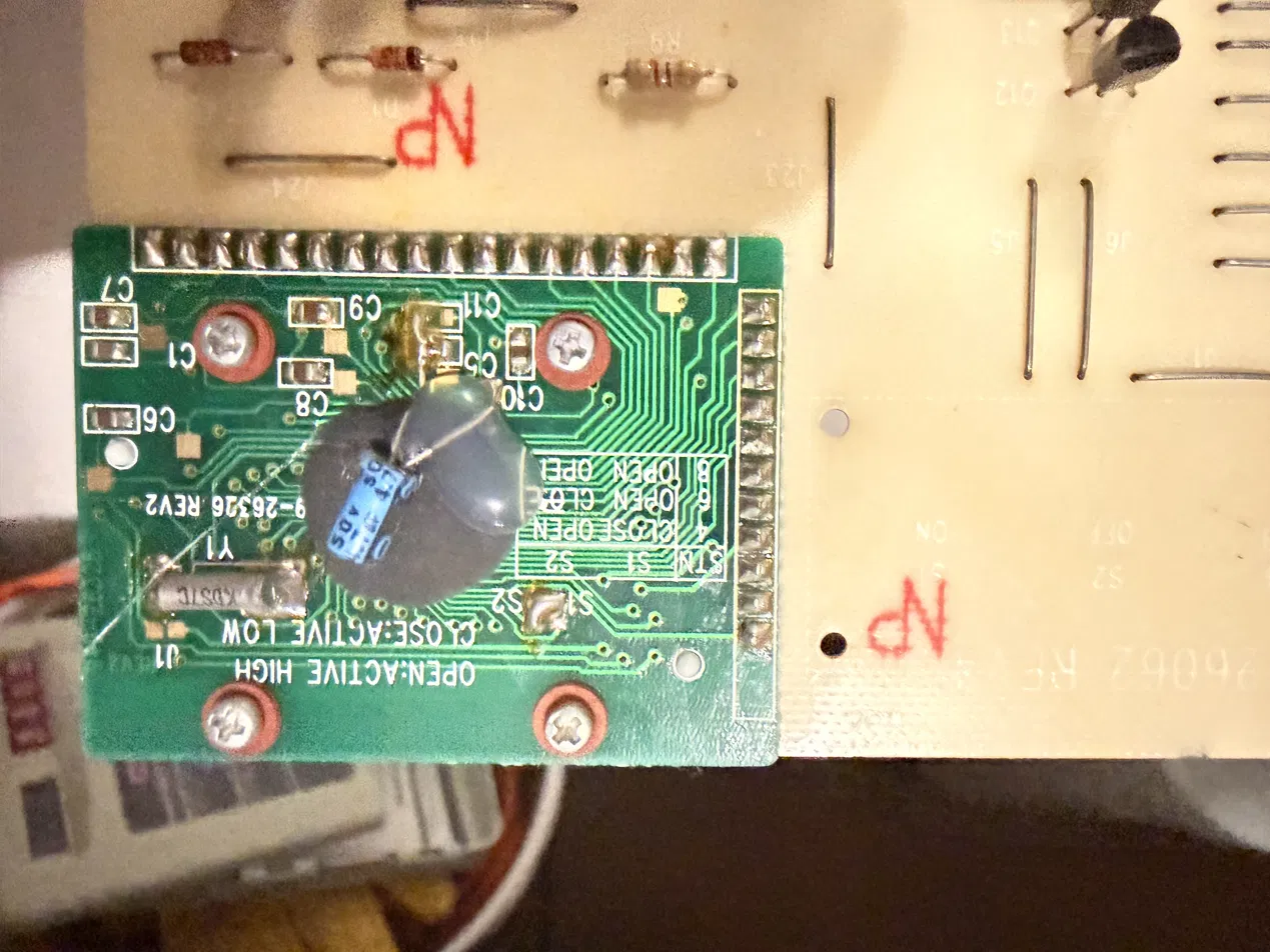COB daughtercard with epoxy-blob microcontroller and a station-count solder-jumper legend